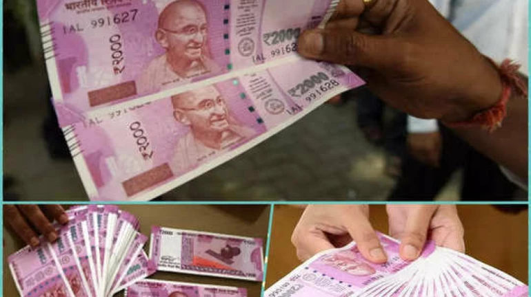 2000 रुपयांची नोट चलनातून बाद, तुमच्याकडे असेल तर हे काम करा 2000 रुपयांची नोट चलनातून बाद, तुमच्याकडे असेल तर हे काम करा