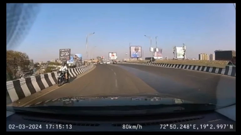 Caught On Camera: Mumbai Police Constable Rides In Wrong Direction On Flyover Caught On Camera: Mumbai Police Constable Rides In Wrong Direction On Flyover
