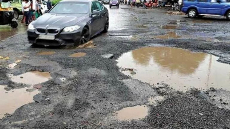 Father of 23-day-old baby dies due to a pothole in Bhiwandi Father of 23-day-old baby dies due to a pothole in Bhiwandi