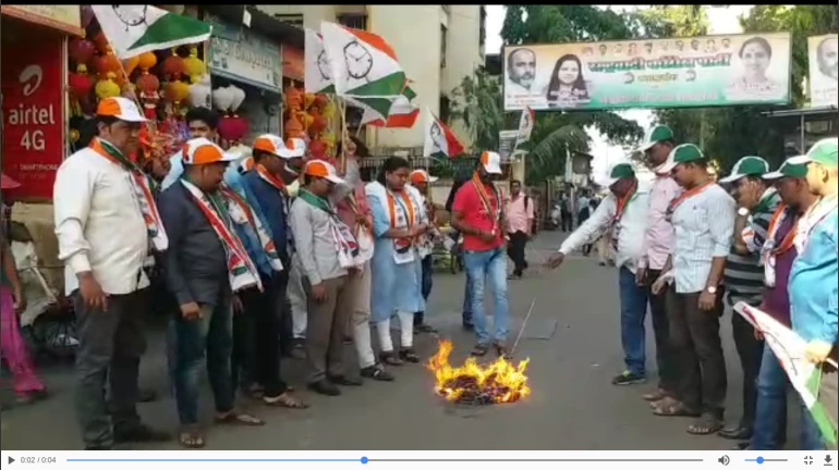 NCP activists protest against Shiv Sena; Burn copies of Saamana NCP activists protest against Shiv Sena; Burn copies of Saamana
