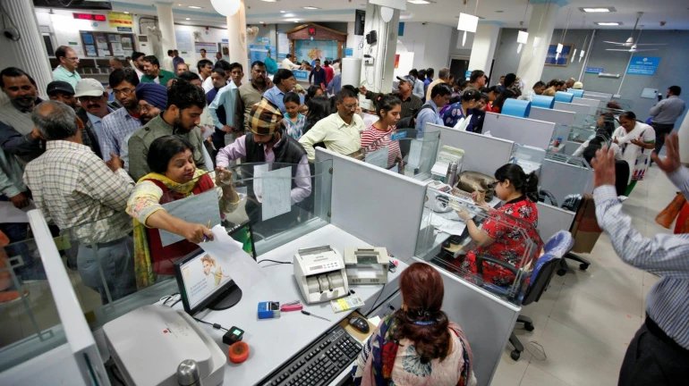 PSU bank employees go on a two-day strike; Banking services to get hit PSU bank employees go on a two-day strike; Banking services to get hit