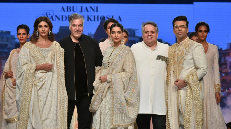 Bollywood celebs walked the ramp for Abu Jani & Sandeep Khosla and Shaina NC at 'Caring with style' fashion show