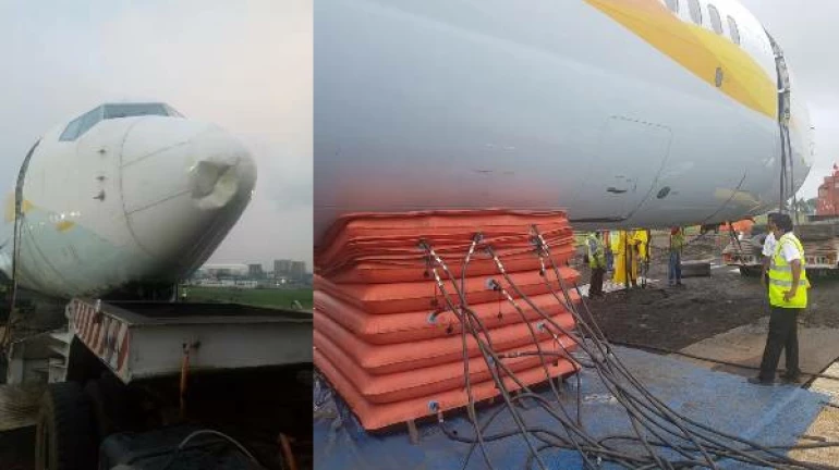 मुख्य रनवे पर दुर्घटनाग्रस्त स्पाइसजेट के विमान को हटाया गया मुख्य रनवे पर दुर्घटनाग्रस्त स्पाइसजेट के विमान को हटाया गया