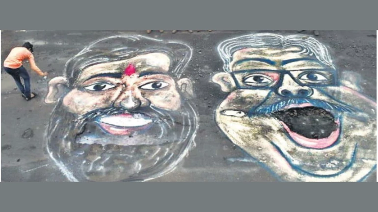 MNS workers protest by drawing PWD Minister Eknath Shinde's face near potholes in Kalyan