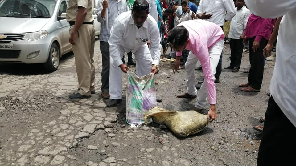 Ganesh Utsav 2019: AIMIM fills potholes for Ganesh devotees