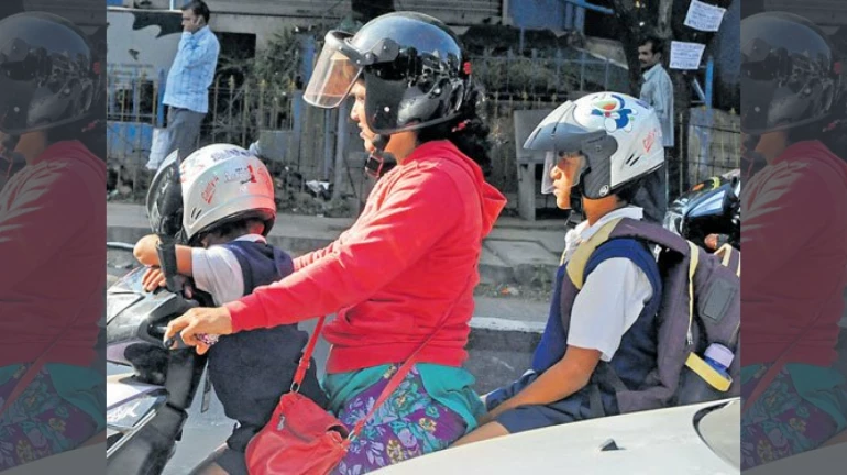 बाइक सवार के साथ अब छोटे बच्चों को भी हेलमेट पहनना अनिवार्य