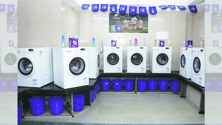 Hindustan Lever Limited and HSBC Bank open a laundry service centre in Andheri East
