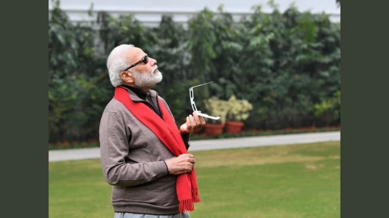 PM Modi’s Maybach sunglasses during the Solar Eclipse inspire a world of memes PM Modi’s Maybach sunglasses during the Solar Eclipse inspire a world of memes