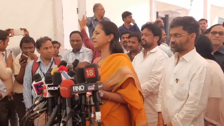 NCP MP Supriya Sule demands Amit Shah's resignation over Delhi violence NCP MP Supriya Sule demands Amit Shah's resignation over Delhi violence