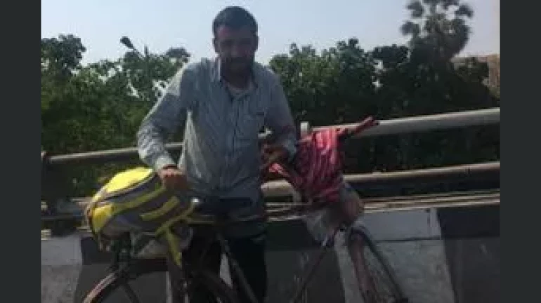 Mumbai Man embarks on a 2,100 km ride to J&K to see his ailing father;