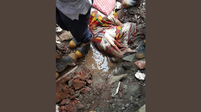 Kurla Wall collapse: Woman trapped inside public toilet rescued Kurla Wall collapse: Woman trapped inside public toilet rescued