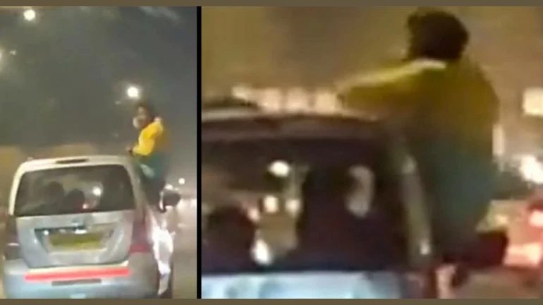 चालत्या कारमधून तरूणाची स्टंटबाजी, पुढे जे झाले ते... चालत्या कारमधून तरूणाची स्टंटबाजी, पुढे जे झाले ते...