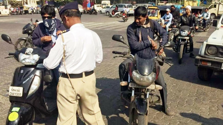 Mumbai: Day 1 Of Crackdown Against Helmetless Pillion Motorist; Riders Unhappy With Move Mumbai: Day 1 Of Crackdown Against Helmetless Pillion Motorist; Riders Unhappy With Move