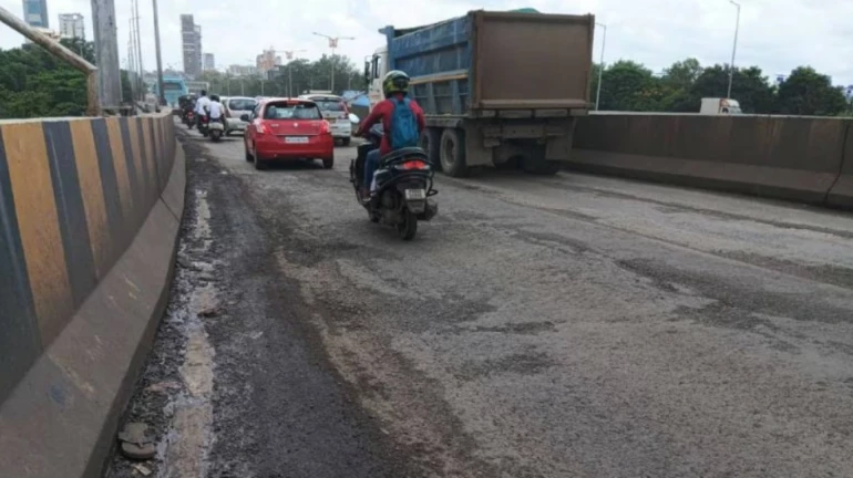 मुंबई : शीव-पनवेल महामार्ग खड्ड्यांतच मुंबई : शीव-पनवेल महामार्ग खड्ड्यांतच