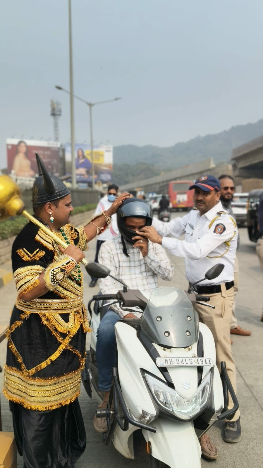Traffic Police distributes 250 helmets to two-wheeler riders during month-long road safety drive