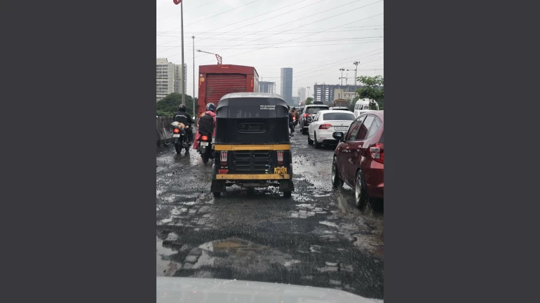 Use Palm Beach as an alternate route, says Navi Mumbai Traffic police; Sion-Panvel road riddled with potholes Use Palm Beach as an alternate route, says Navi Mumbai Traffic police; Sion-Panvel road riddled with potholes