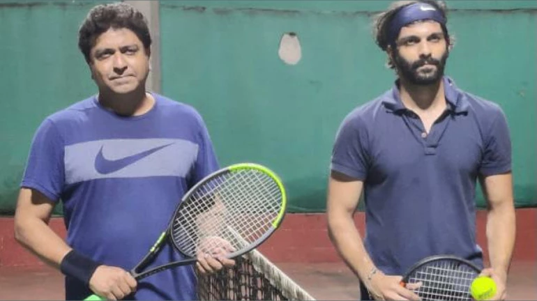 Raj Thackeray and son Amit enjoy a game of tennis