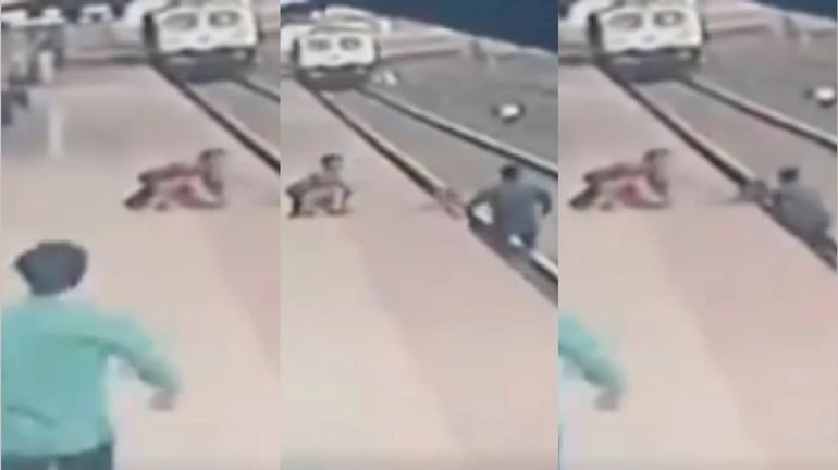 Thane: Railway pointsman puts his life on line to save kid; CR to award the real-life hero for his bravery Thane: Railway pointsman puts his life on line to save kid; CR to award the real-life hero for his bravery