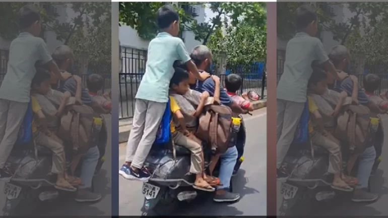 Mumbai Man Arrested for Endangering Lives of 7 Children & Violating Traffic Rules Mumbai Man Arrested for Endangering Lives of 7 Children & Violating Traffic Rules