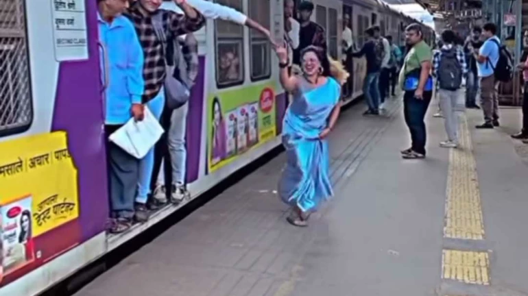 Mumbai: Woman dancing on platform endangering passenger's life Mumbai: Woman dancing on platform endangering passenger's life