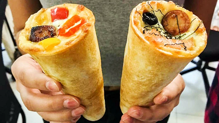This place in Bandra serves lip-smacking pizzas in a cone you can eat on-the-go!