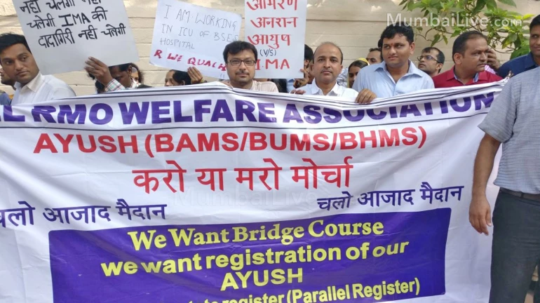 Bridge course row: Homeopathy doctors carry out a rally against NMC for scraping bridge course