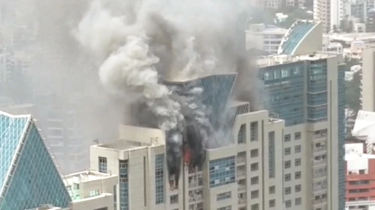 Firefighters risking their lives; ladder can reach only up to the 30th floor