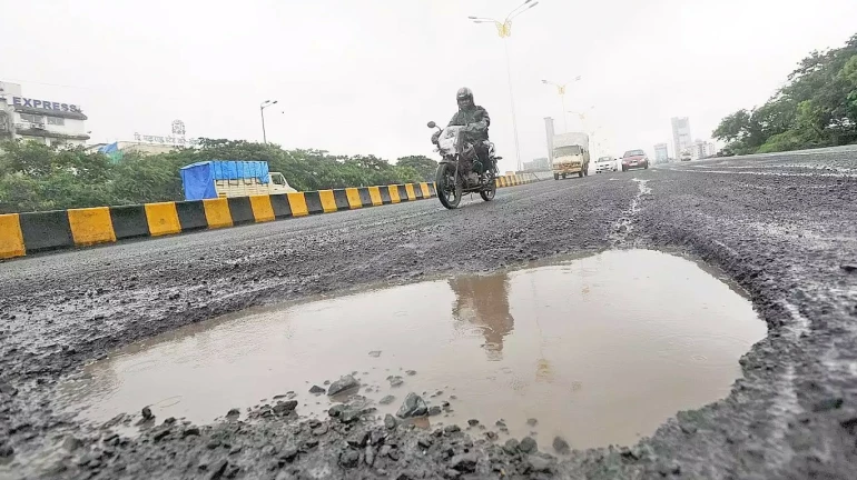 Mumbaikar fills up over 500 potholes in the memory of his deceased son