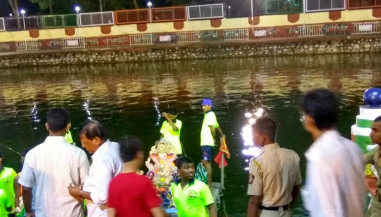 Devotees immersed idols at Aksa beach 